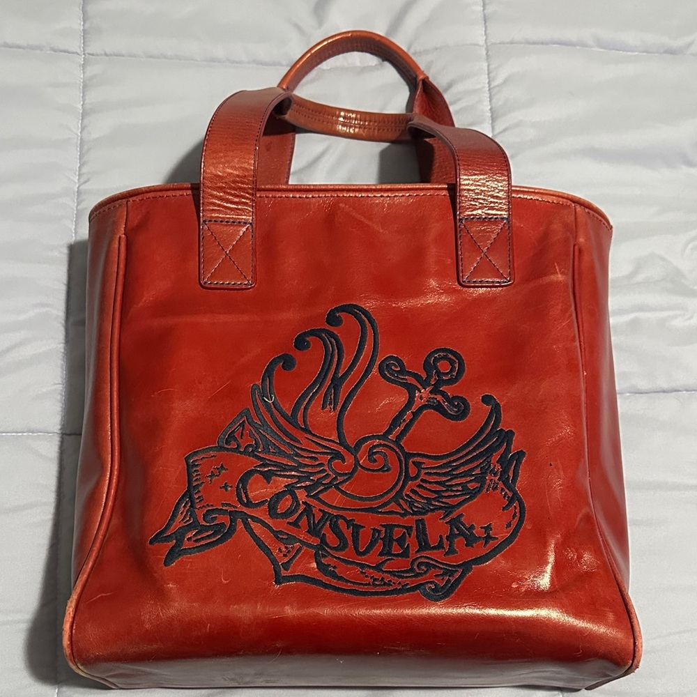 Consuela Red Leather Bag with Black Design